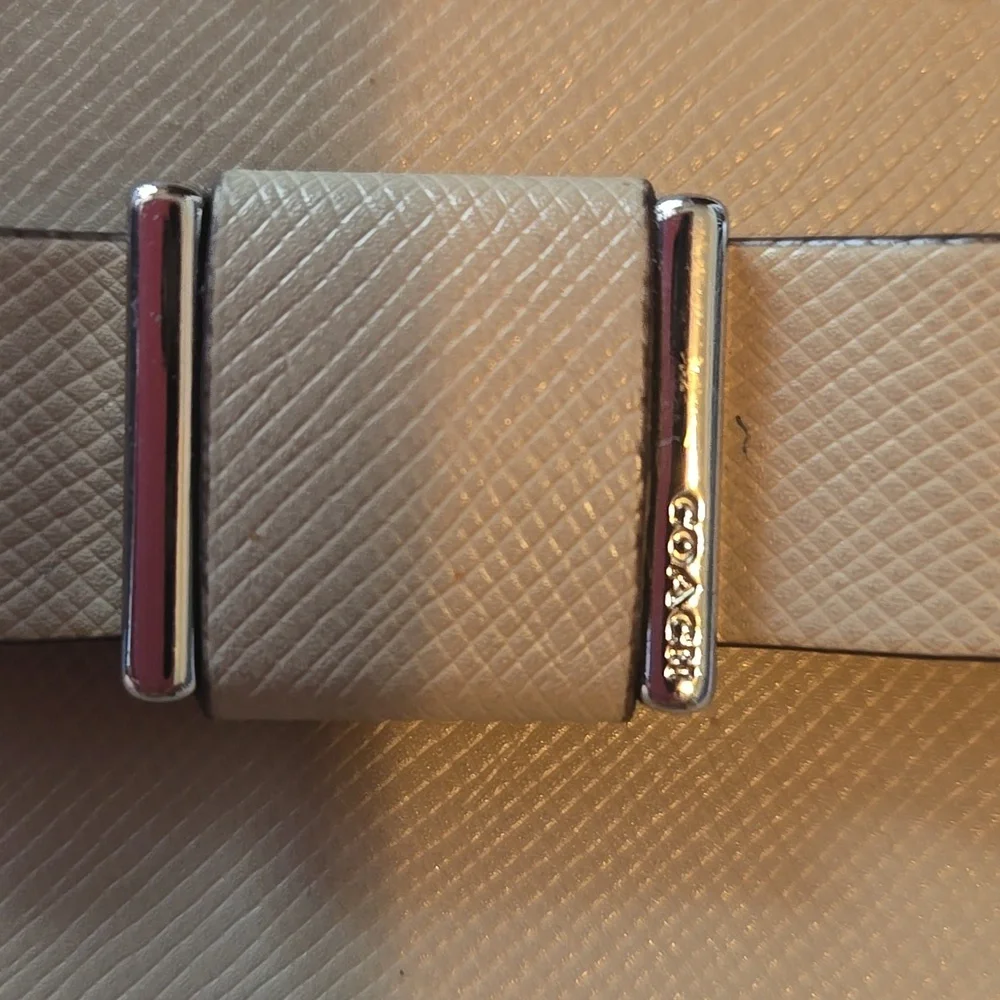 Coach Tan Wristlet Clutch with Bow Accent